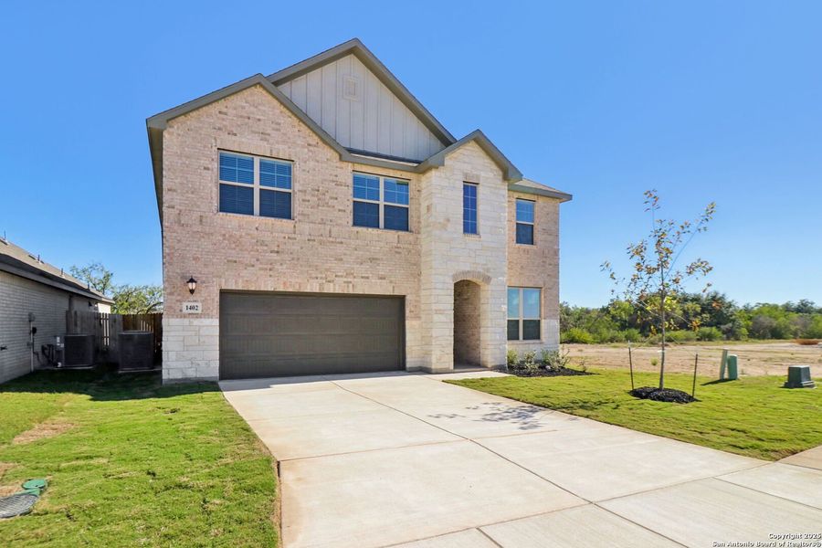 Front exterior of a new home in , San Antonio, TX, highlighting curb appeal (Image 1). Front exterior of a new home in , San Antonio, TX, highlighting curb appeal (Image 1).