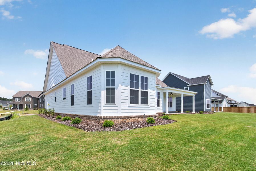 Exterior details and patio area of a home in Highland Lakes, Evans (Image 32).