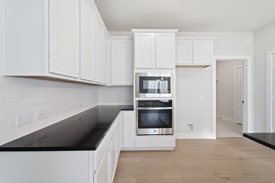 Furnished interior view inside a new home in The Woodlands at Medina Hills, Mico (Image 14).