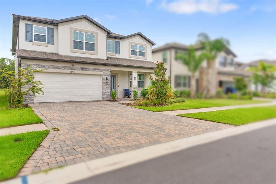 Front exterior of a new home in , Tampa, FL, highlighting curb appeal (Image 29).