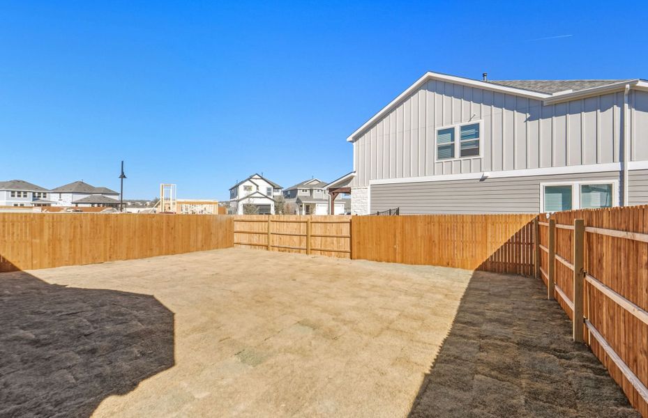 Exterior details and patio area of a home in Santa Rita Ranch, Liberty Hill (Image 24). Exterior details and patio area of a home in Santa Rita Ranch, Liberty Hill (Image 24).