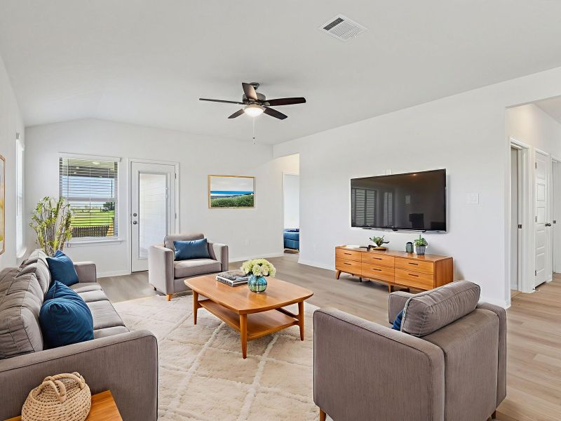 Virtually staged living room in the Allen floorplan at a Meritage Homes community. Virtually staged living room in the Allen floorplan at a Meritage Homes community.