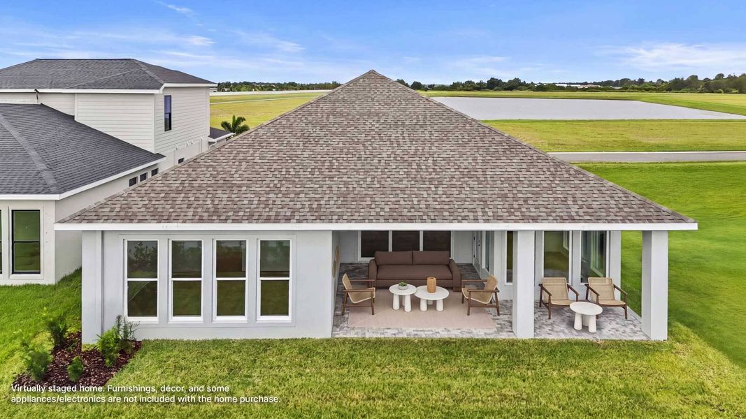Exterior details and patio area of a home in Reserve at Berry Bay, Wimauma (Image 3).
