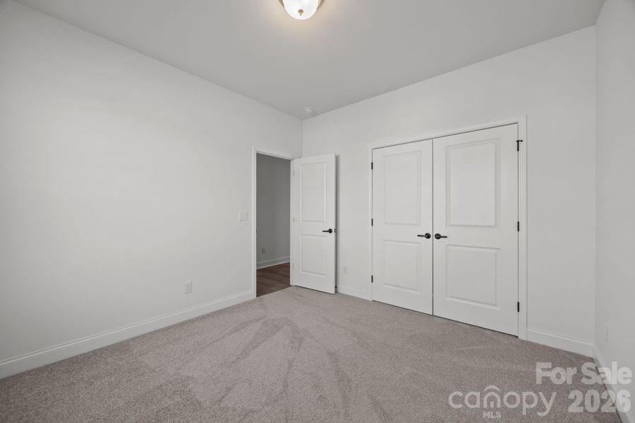 Secondary Bedroom Photos are representative and may not reflect the exact home, finishes, or features.