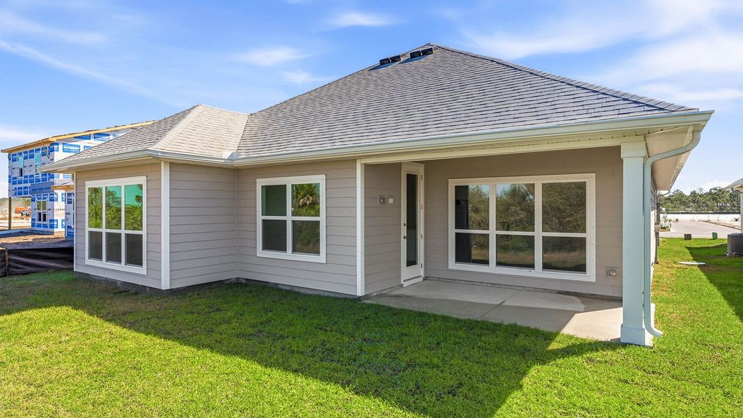 Exterior details and patio area of a home in WindMark Beach, Port Saint Joe (Image 3).