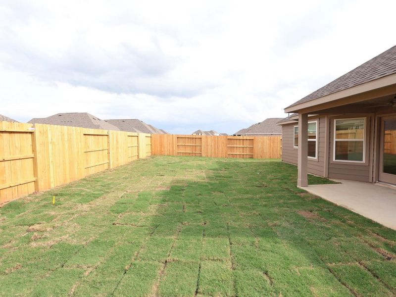 Front exterior of a new home in Sorella, Tomball, TX, highlighting curb appeal (Image 13).