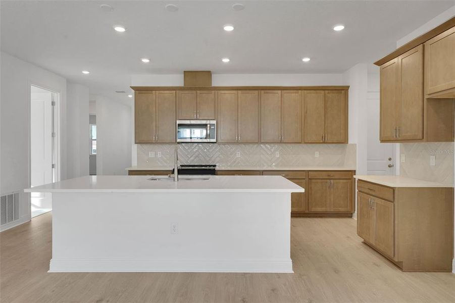 Furnished interior view inside a new home in Green Key Village, Lady Lake (Image 18).