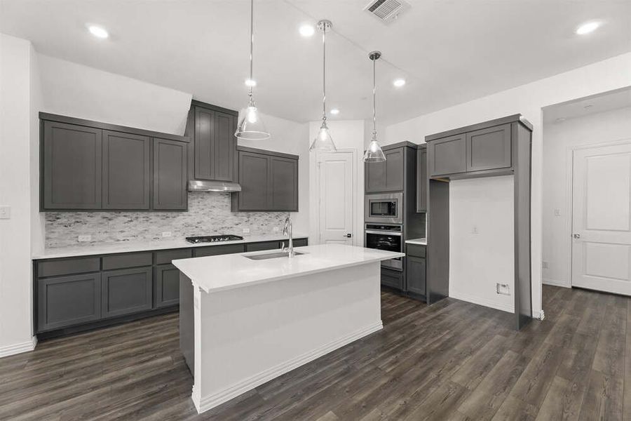 Brown Townhome Kitchen by Ashton Woods