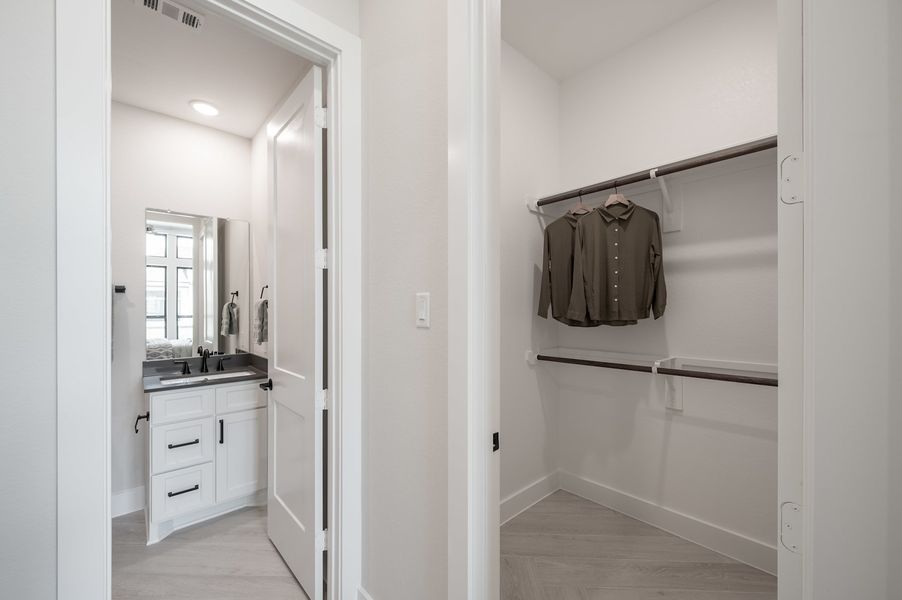 Representative furnished interior of a home built from the Carignan by Tri Pointe Homes in Woodson’s Reserve, Spring (Image 68).