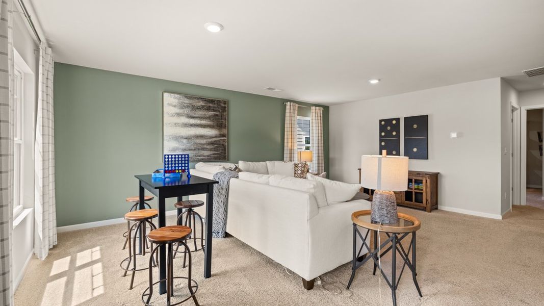 Representative furnished interior of a home built from the Elle by D.R. Horton in The Preserve at Agricultural Village, Perry (Image 28).