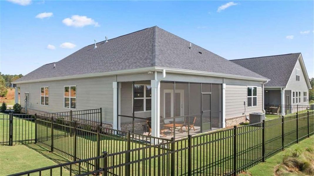 Exterior details and patio area of a home in Oak Ridge Meadows, Locust Grove (Image 4).