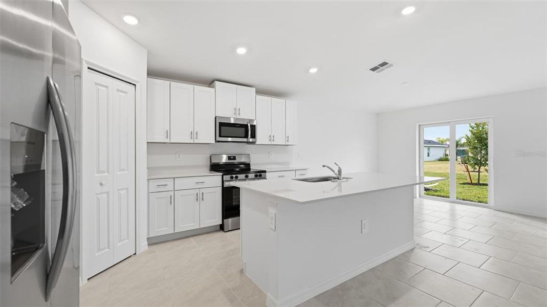 Furnished interior view inside a new home in Rotonda Lakes, Rotonda West (Image 9).