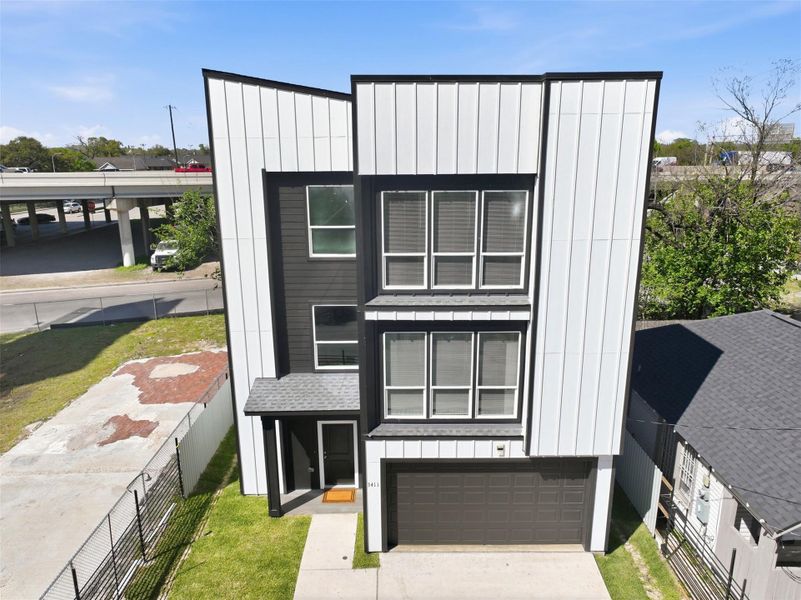 Front exterior of a new home in , Houston, TX, highlighting curb appeal (Image 20).