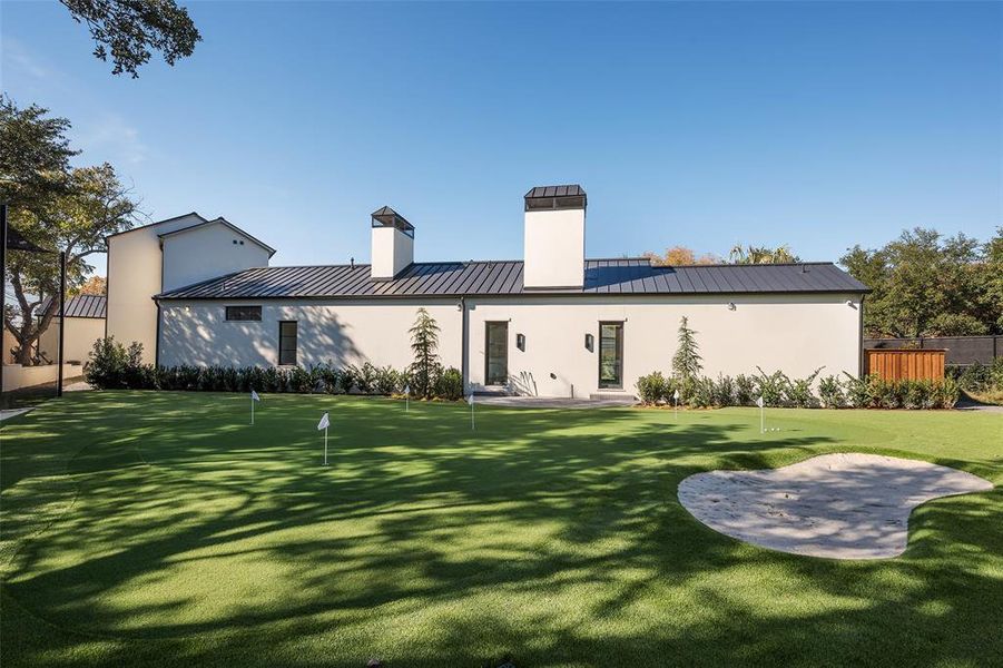 Putting greens off the side of the home.