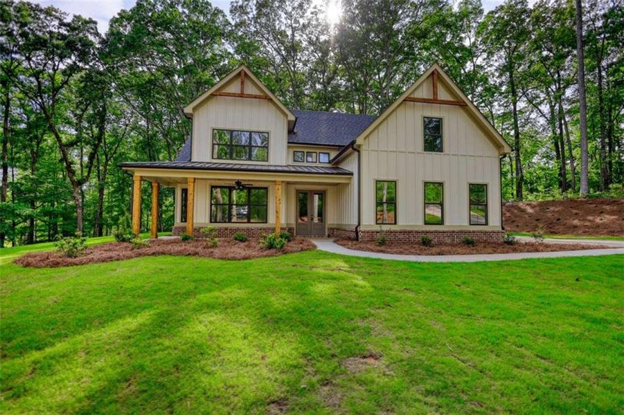 Front exterior of a new home in , Monticello, GA, highlighting curb appeal (Image 26).