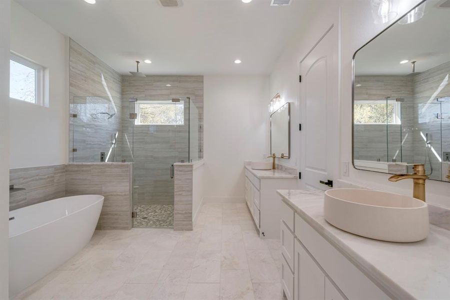 Bathroom with vanity and plus walk in shower