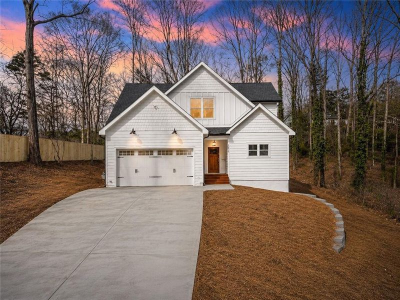 Front exterior of a new home in , Woodstock, GA, highlighting curb appeal (Image 1). Front exterior of a new home in , Woodstock, GA, highlighting curb appeal (Image 1).