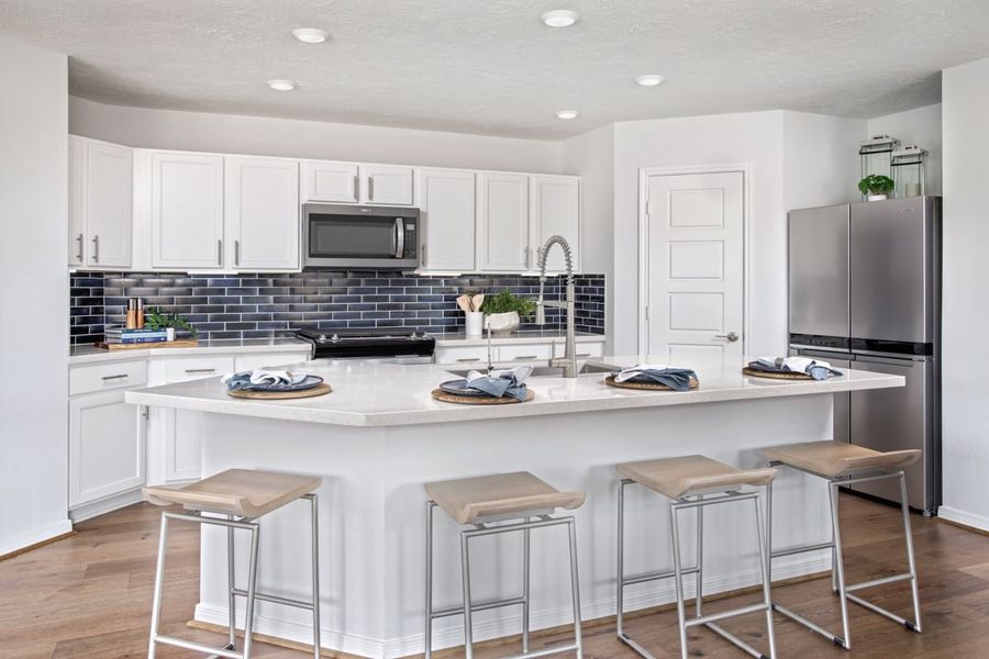 Representative furnished interior of a home built from the Plan 1702 Modeled by KB Home in Sunset Grove South, Hitchcock (Image 5).