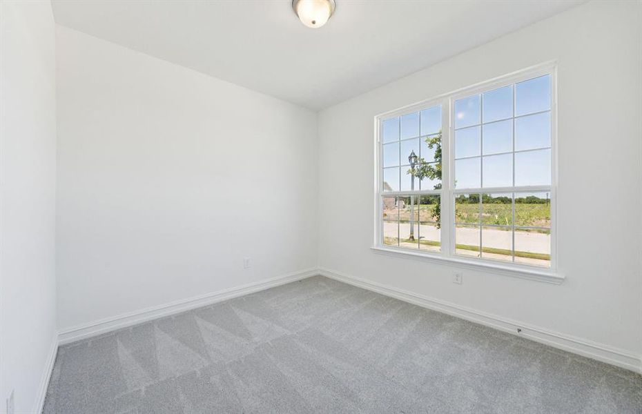 Spacious secondary bedroom with large windows *real home pictured Spacious secondary bedroom with large windows *real home pictured