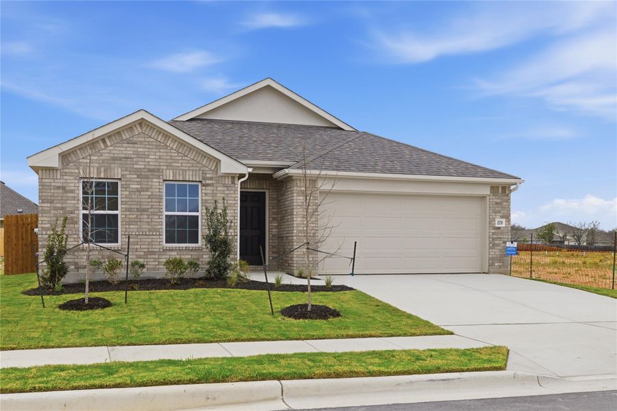 Front exterior of a new home in Infinity Square, Kyle, TX, highlighting curb appeal (Image 19).