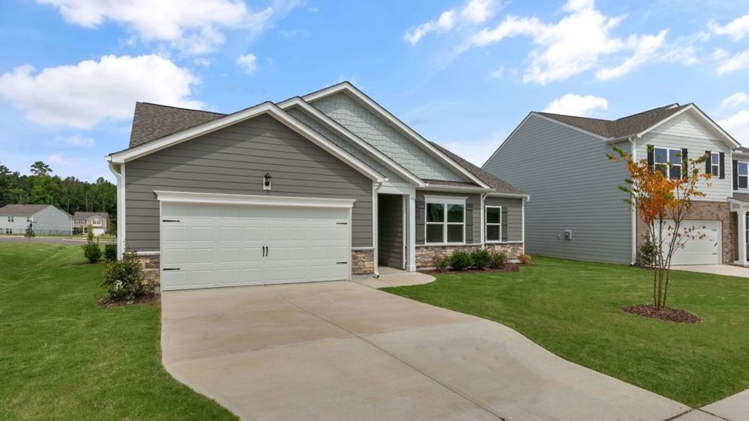 Representative exterior photo of a completed home built from the BOOTH by D.R. Horton in Anderson Farm, Wendell, NC (Image 18).