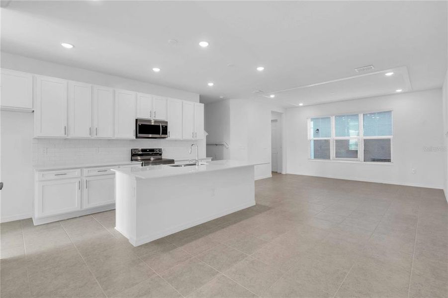 Furnished interior view inside a new home in The Residences at Emerson Park, Apopka (Image 6).