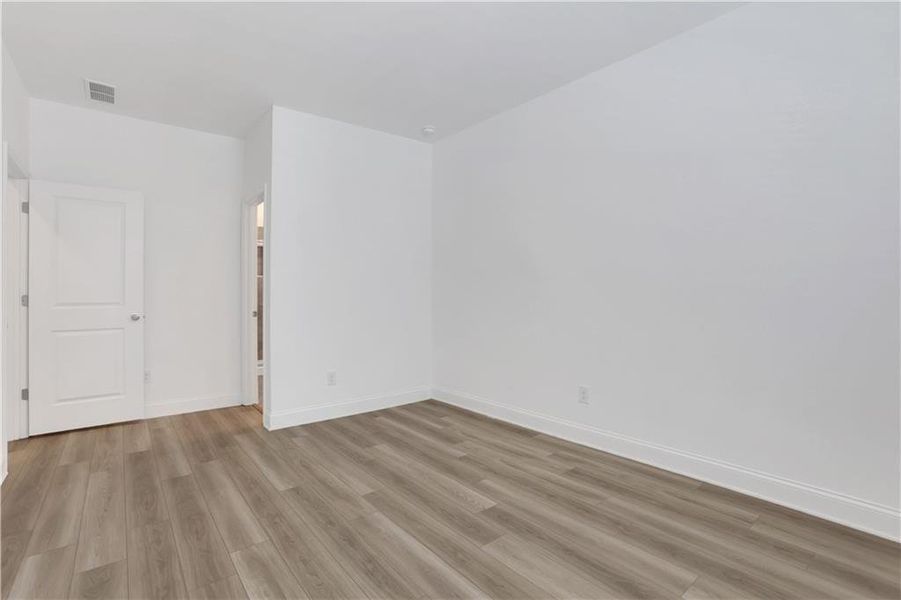 Spacious, unfurnished interior of a new home in Bailey Fence, Dacula (Image 38).