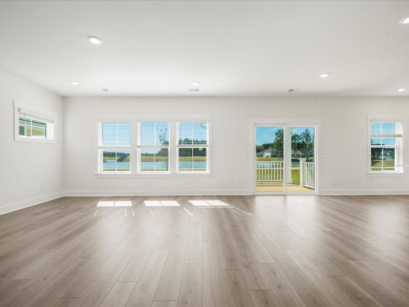 Spacious, unfurnished interior of a new home in The Coves at Lakes of Cane Bay II, Summerville (Image 34).