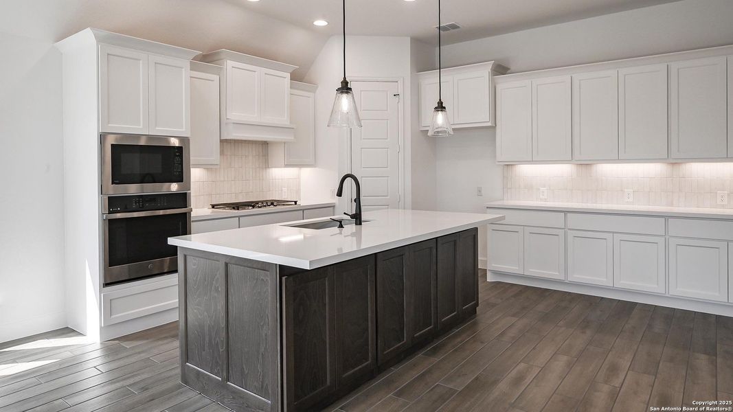 Furnished interior view inside a new home in Homestead 65', Schertz (Image 12).
