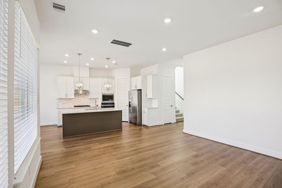 Furnished interior view inside a new home in Pinewood Trails - Luxe Series, Houston (Image 10).