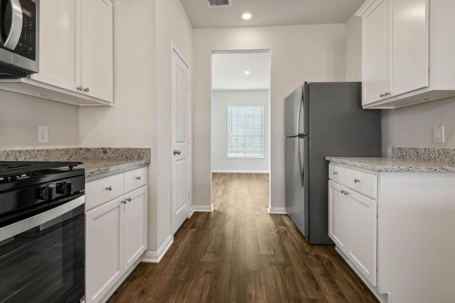 Furnished interior view inside a new home in Trails at Cochran Ranch, Waller (Image 3).