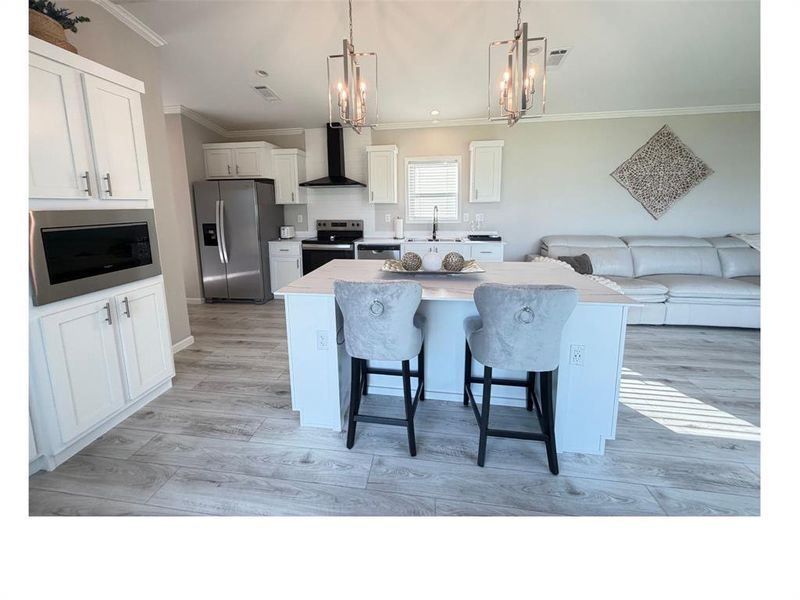 Furnished interior view inside a new home in , Runaway Bay (Image 16).