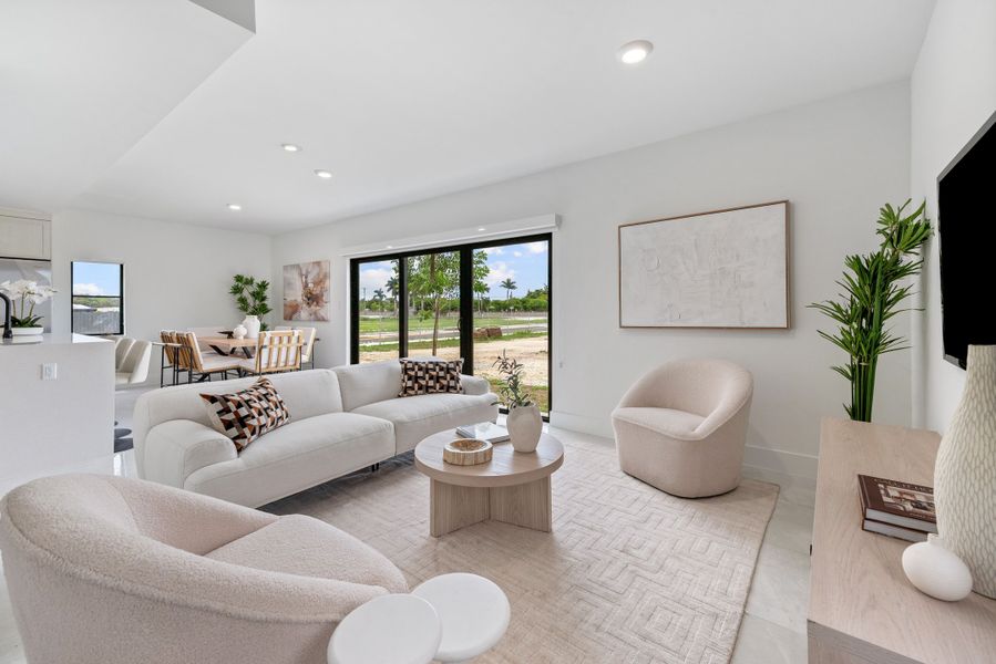 Representative furnished interior of a home built from the Model E by Onx Homes in On Alba, Florida City (Image 34).