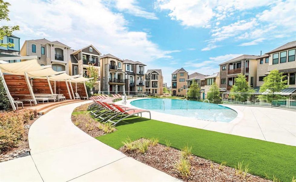 View of pool featuring a lawn