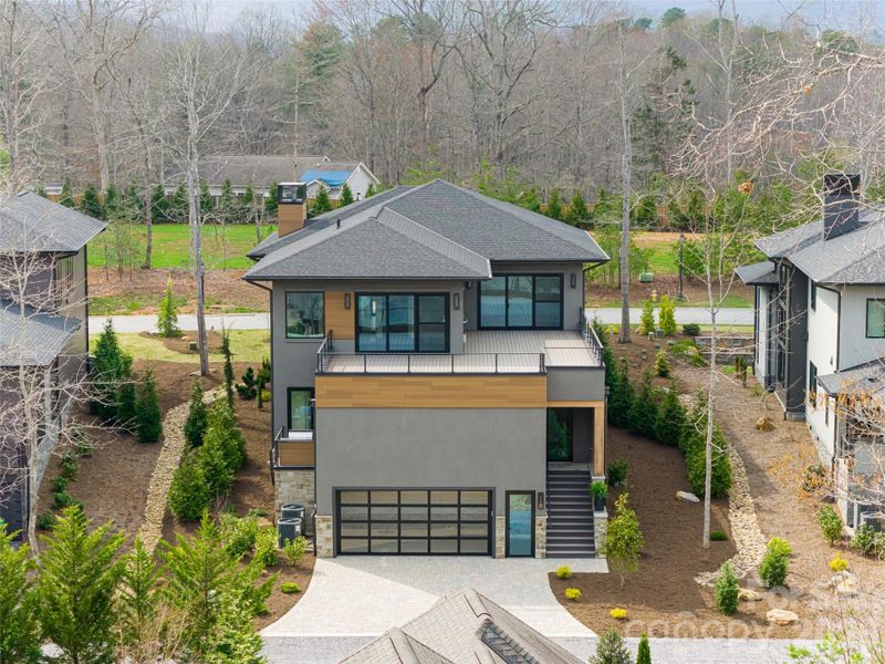 Front exterior of a new home in , Arden, NC, highlighting curb appeal (Image 28).