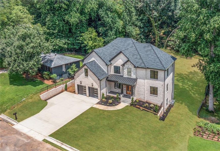 Front exterior of a new home in , Buford, GA, highlighting curb appeal (Image 1). Front exterior of a new home in , Buford, GA, highlighting curb appeal (Image 1).