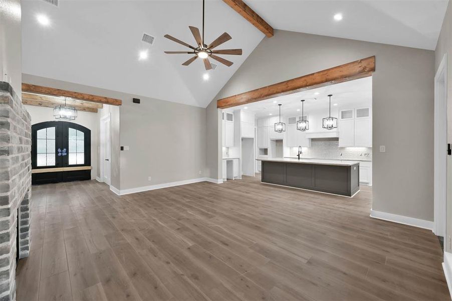 Open concept home that connects living area to the kitchen for entertainment and family gatherings