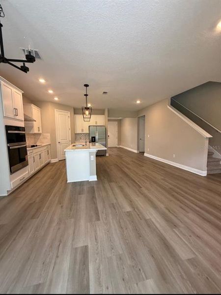 Spacious, unfurnished interior of a new home in Legends Preserve - Signature Series, Daytona Beach (Image 10).