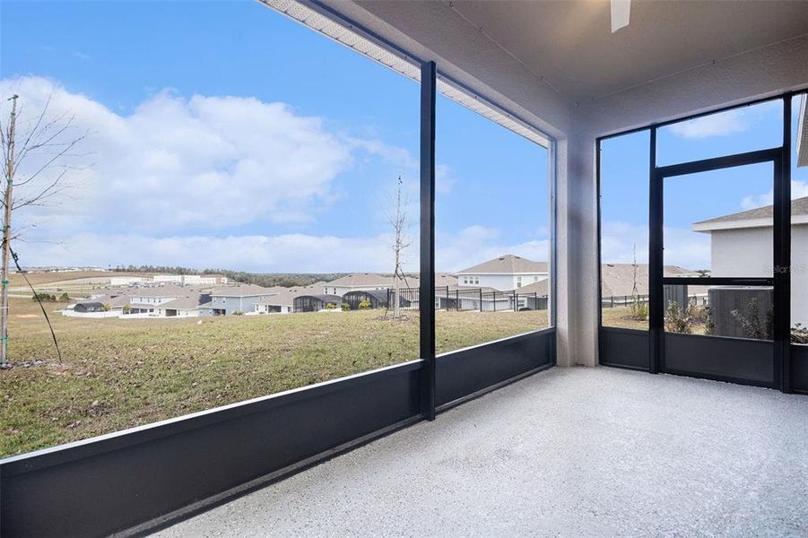 Exterior details and patio area of a home in Hills of Minneola, Minneola (Image 28).