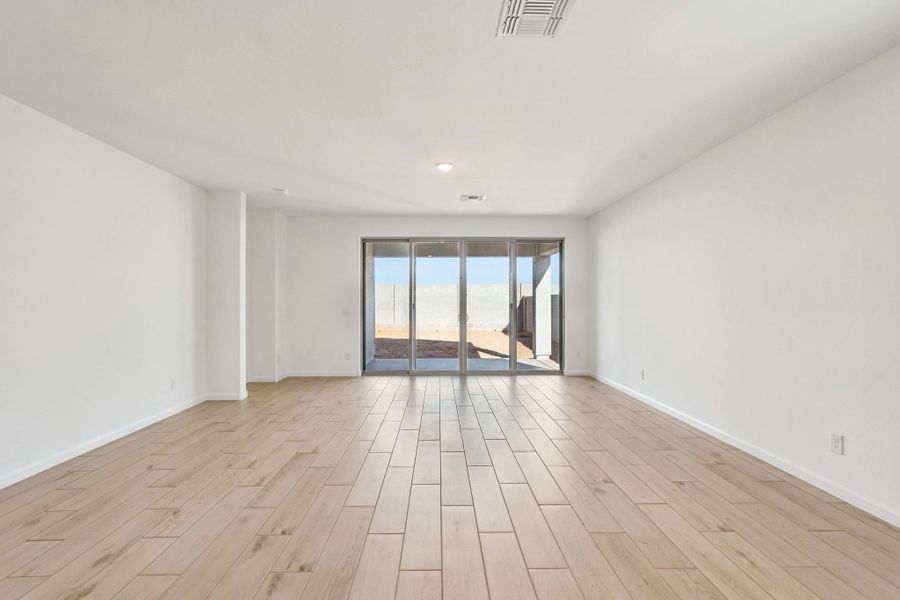great room with 4 panel slider. Representative images and renderings are for illustrative purposes. Actual structural options and design finishes of home may vary.