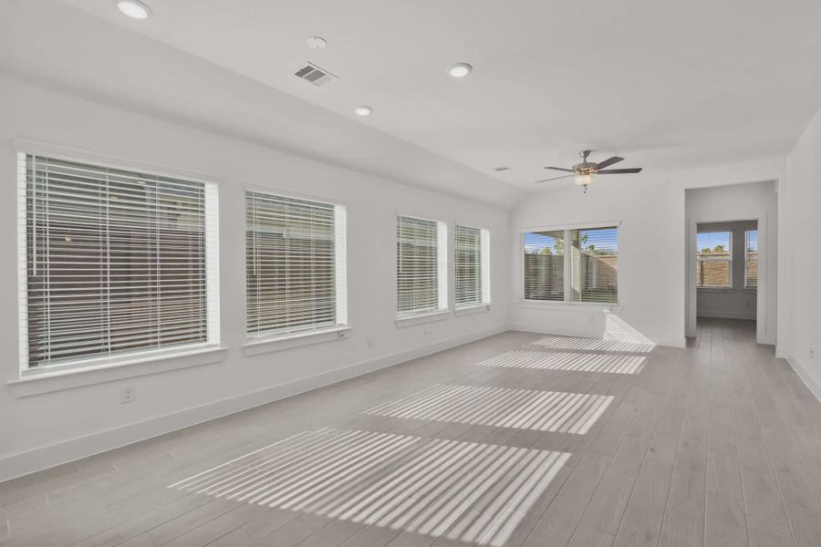 Representative unfurnished interior of a home built from the Carriagehouse by Chesmar Homes in Meridiana Townhomes, Iowa Colony (Image 91).