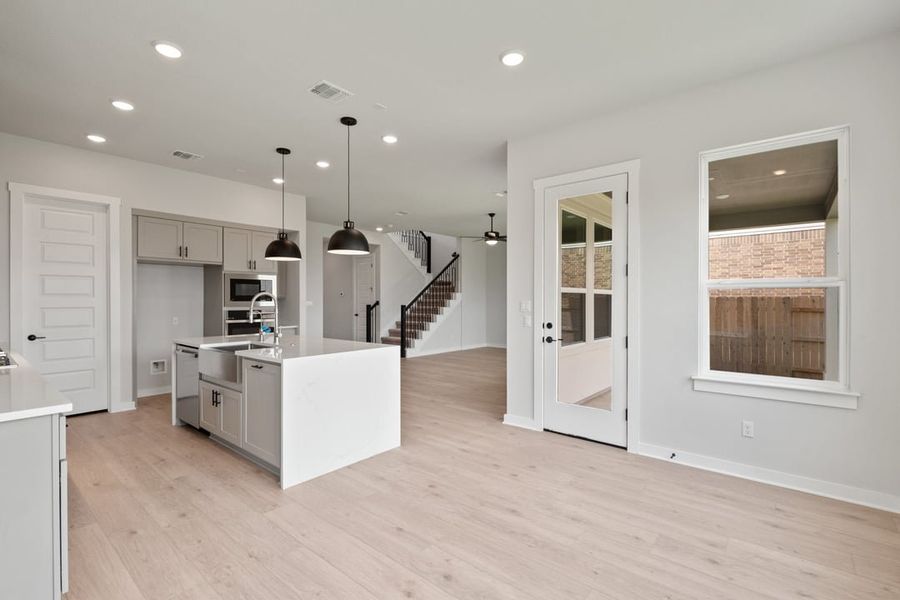 Furnished interior view inside a new home in Arbor Collection at Lariat, Liberty Hill (Image 7). Furnished interior view inside a new home in Arbor Collection at Lariat, Liberty Hill (Image 7).