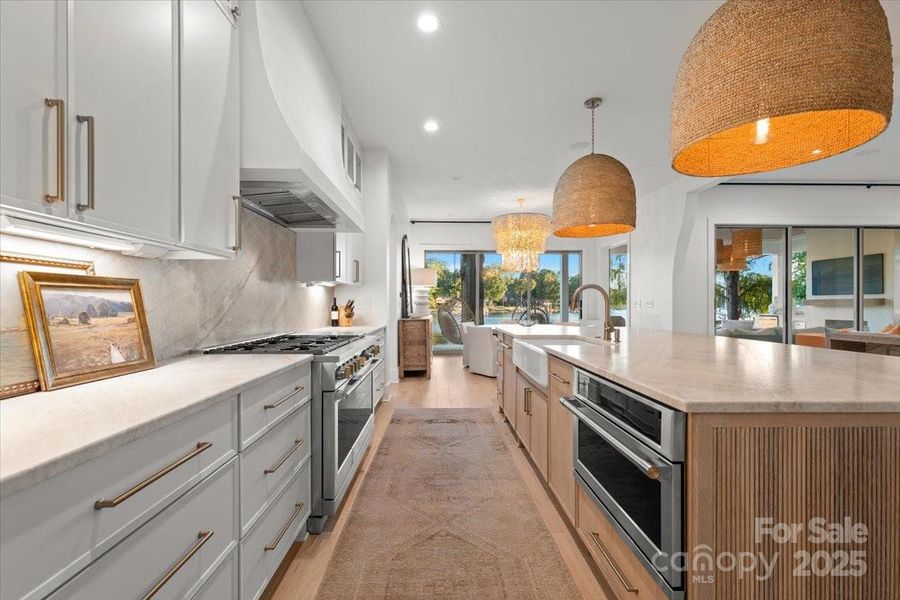 High-end appliance package featuring Monogram appliances including a 36" refrigerator, 36" freezer, 24" dual convection Microwave, 48" stove and two dishwashers. High-end appliance package featuring Monogram appliances including a 36" refrigerator, 36" freezer, 24" dual convection Microwave, 48" stove and two dishwashers.