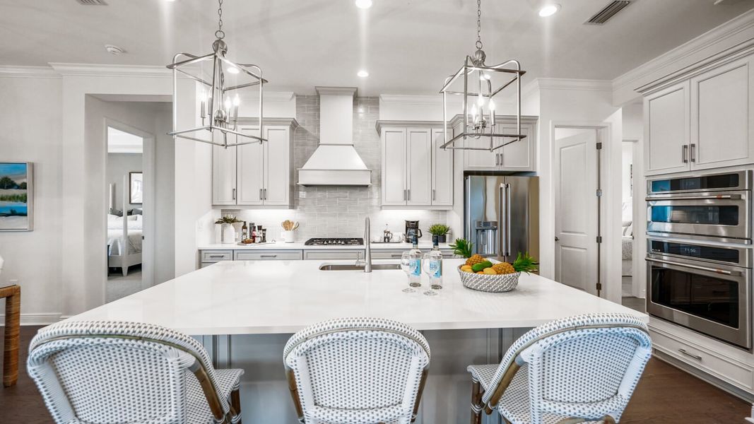 Furnished interior view inside a new home in SkySail, Naples (Image 11).