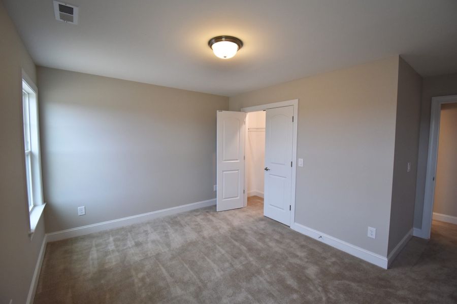 Representative unfurnished interior of a home built from the Lancaster by Keystone Homes NC in Preserve at Carriage Cove, Oak Ridge (Image 28).