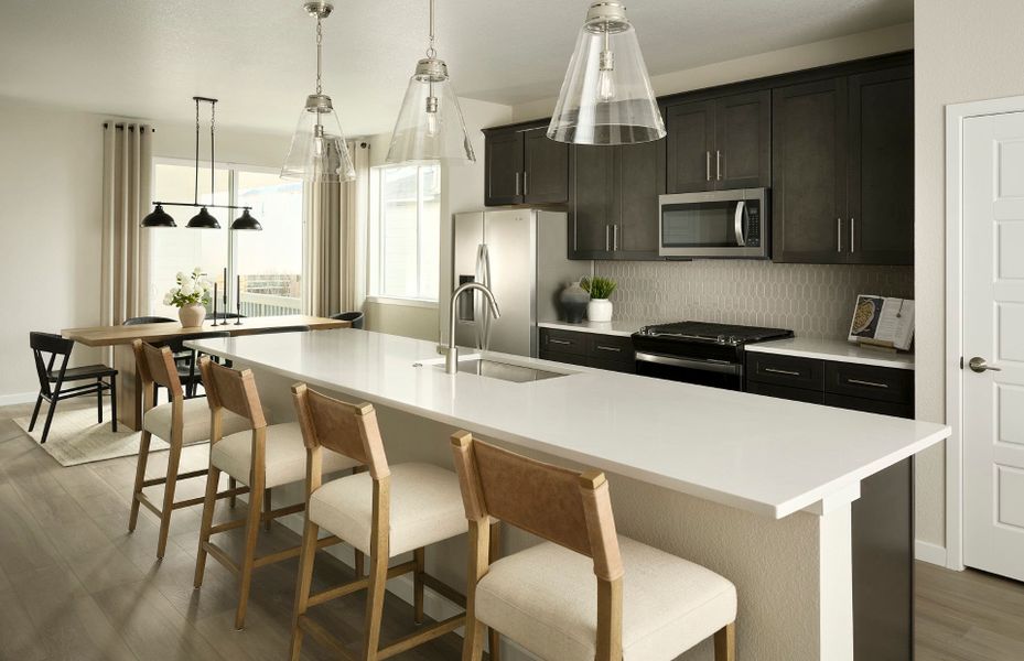 Furnished interior view inside a new home in Barefoot Village, Firestone (Image 9).