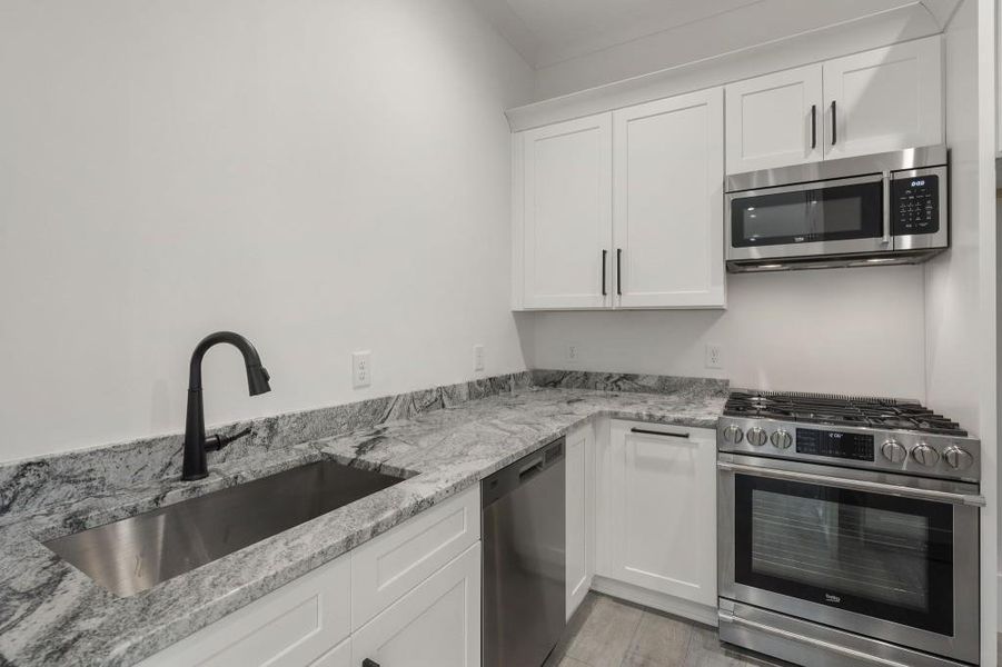 Furnished interior view inside a new home in , Buford (Image 30).