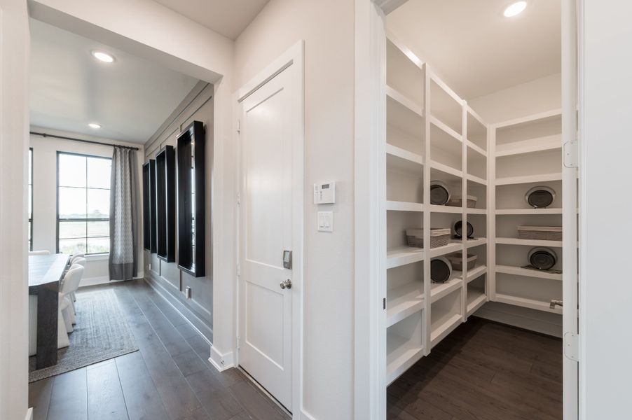 Representative furnished interior of a home built from the Bogata by Tri Pointe Homes in Harvest Green, Richmond (Image 51).