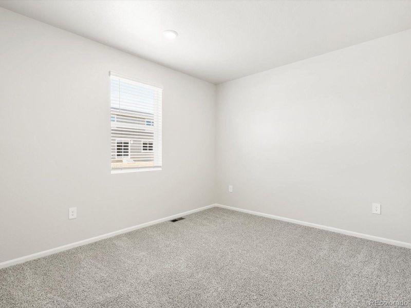 Spacious, unfurnished interior of a new home in Poudre Heights: The Alpine Collection, Windsor (Image 23).