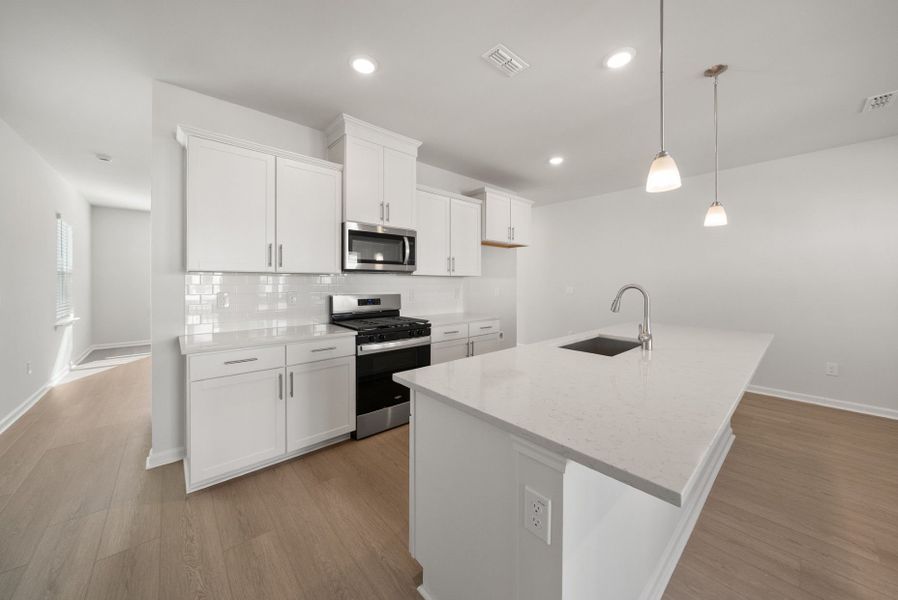 Furnished interior view inside a new home in Huxley, Apex (Image 11).